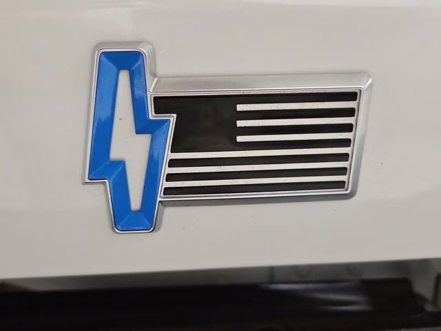 2024 Star White Metallic Tri-Coat Ford F-150 Lightning Platinum AWD Truck