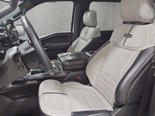 2024 Star White Metallic Tri-Coat Ford F-150 Lightning Platinum AWD Truck