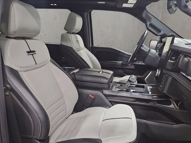 2024 Star White Metallic Tri-Coat Ford F-150 Lightning Platinum AWD Truck