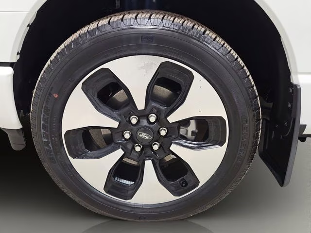 2024 Star White Metallic Tri-Coat Ford F-150 Lightning Platinum AWD Truck