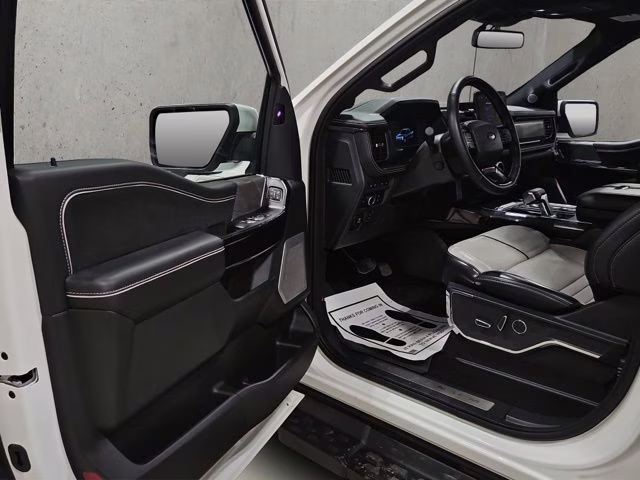 2024 Star White Metallic Tri-Coat Ford F-150 Lightning Platinum AWD Truck