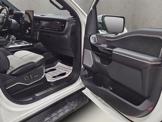 2024 Star White Metallic Tri-Coat Ford F-150 Lightning Platinum AWD Truck