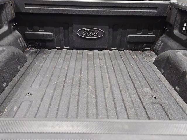 2024 Star White Metallic Tri-Coat Ford F-150 Lightning Platinum AWD Truck