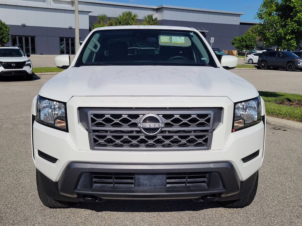 2023 Glacier White Nissan Frontier SV 4X4 Truck