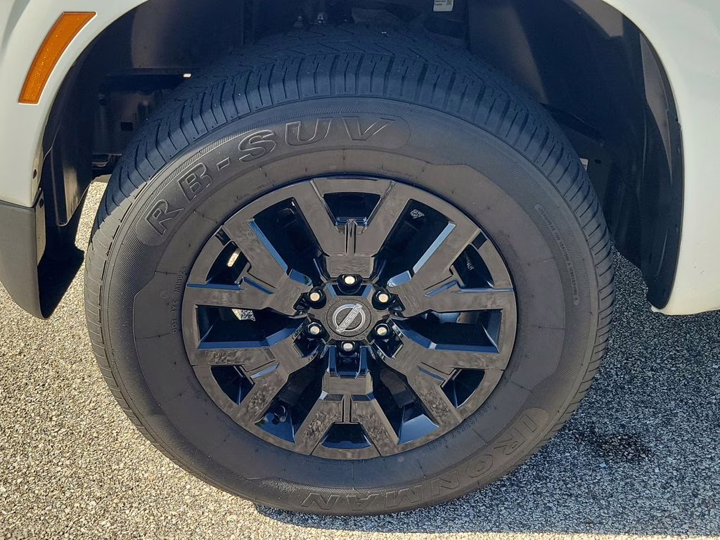 2023 Glacier White Nissan Frontier SV 4X4 Truck