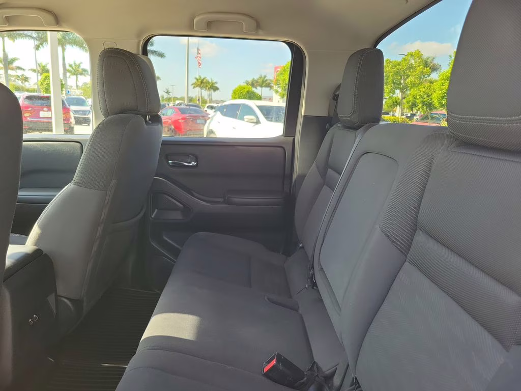 2023 Glacier White Nissan Frontier SV 4X4 Truck