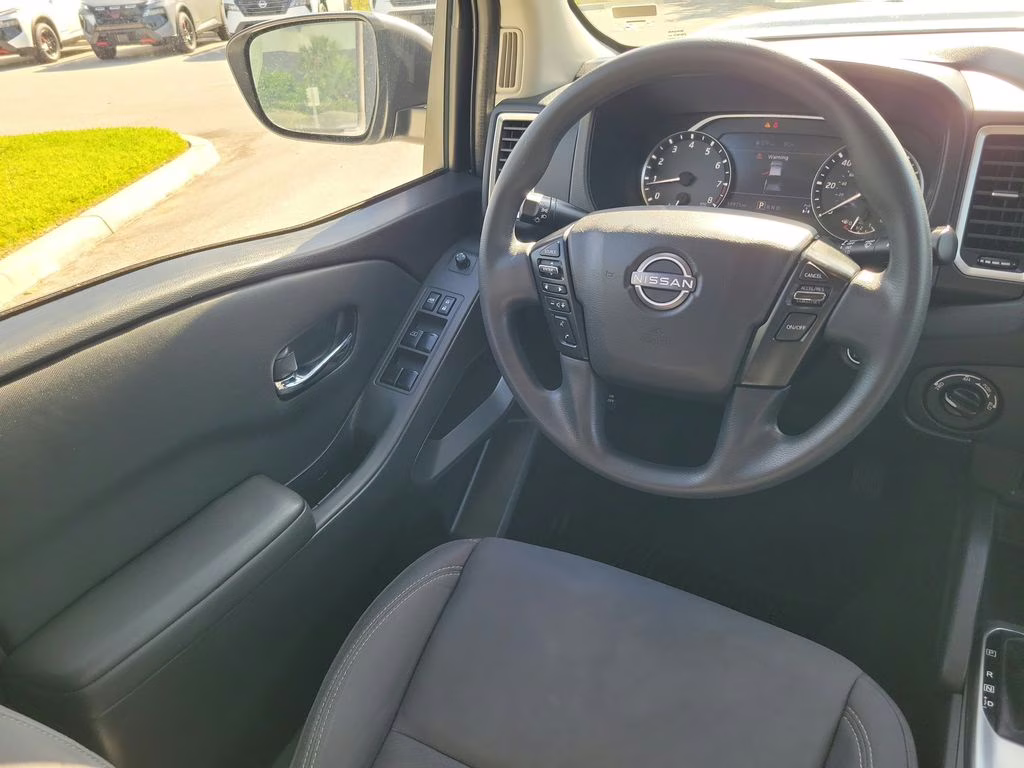 2023 Glacier White Nissan Frontier SV 4X4 Truck
