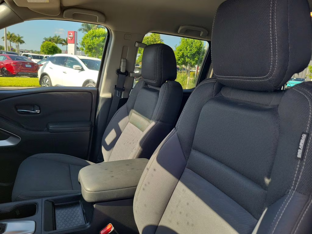 2023 Glacier White Nissan Frontier SV 4X4 Truck