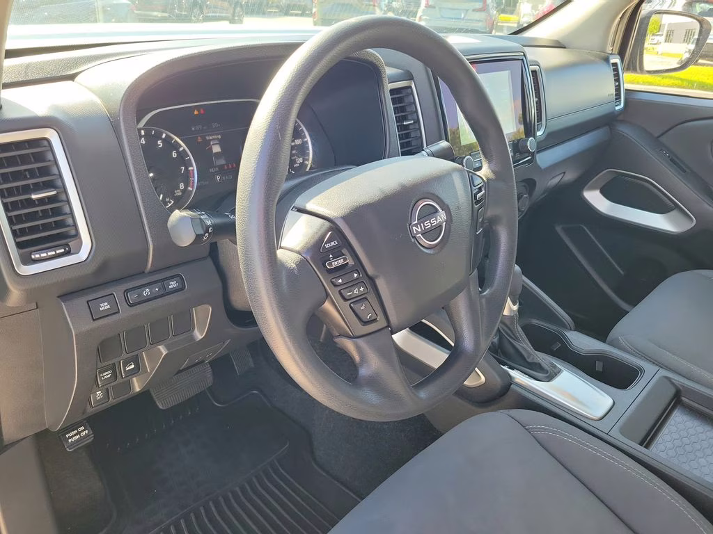 2023 Glacier White Nissan Frontier SV 4X4 Truck