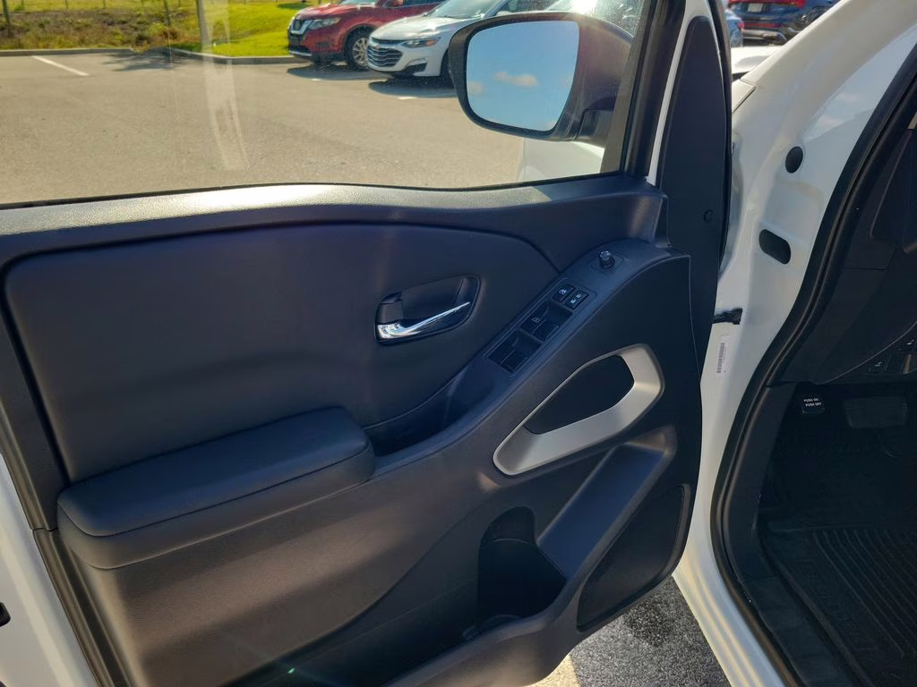 2023 Glacier White Nissan Frontier SV 4X4 Truck