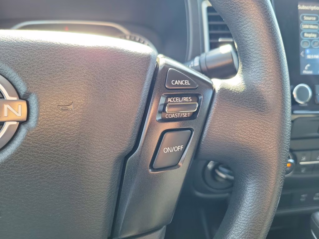 2023 Glacier White Nissan Frontier SV 4X4 Truck
