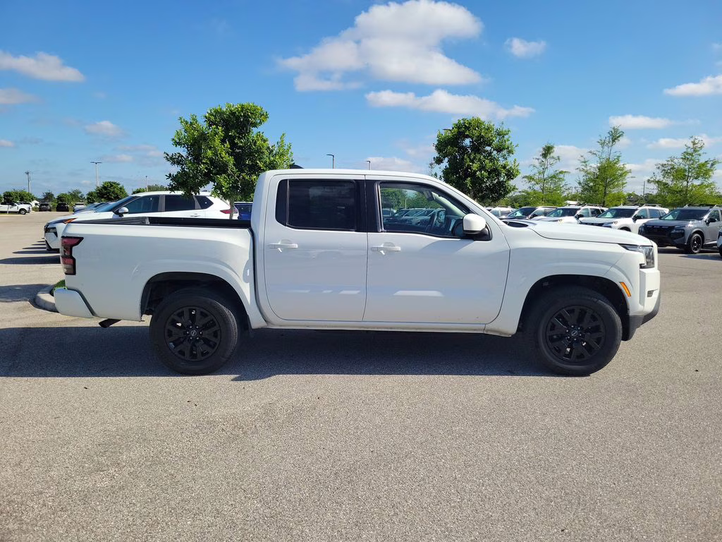 2023 Glacier White Nissan Frontier SV 4X4 Truck