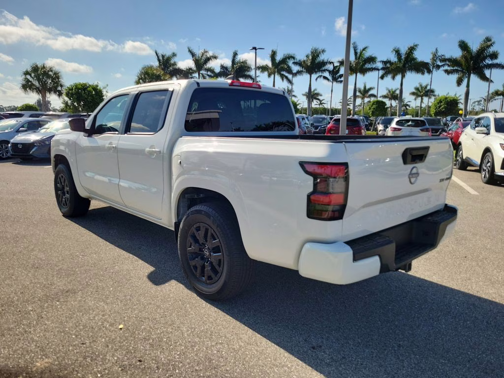 2023 Glacier White Nissan Frontier SV 4X4 Truck