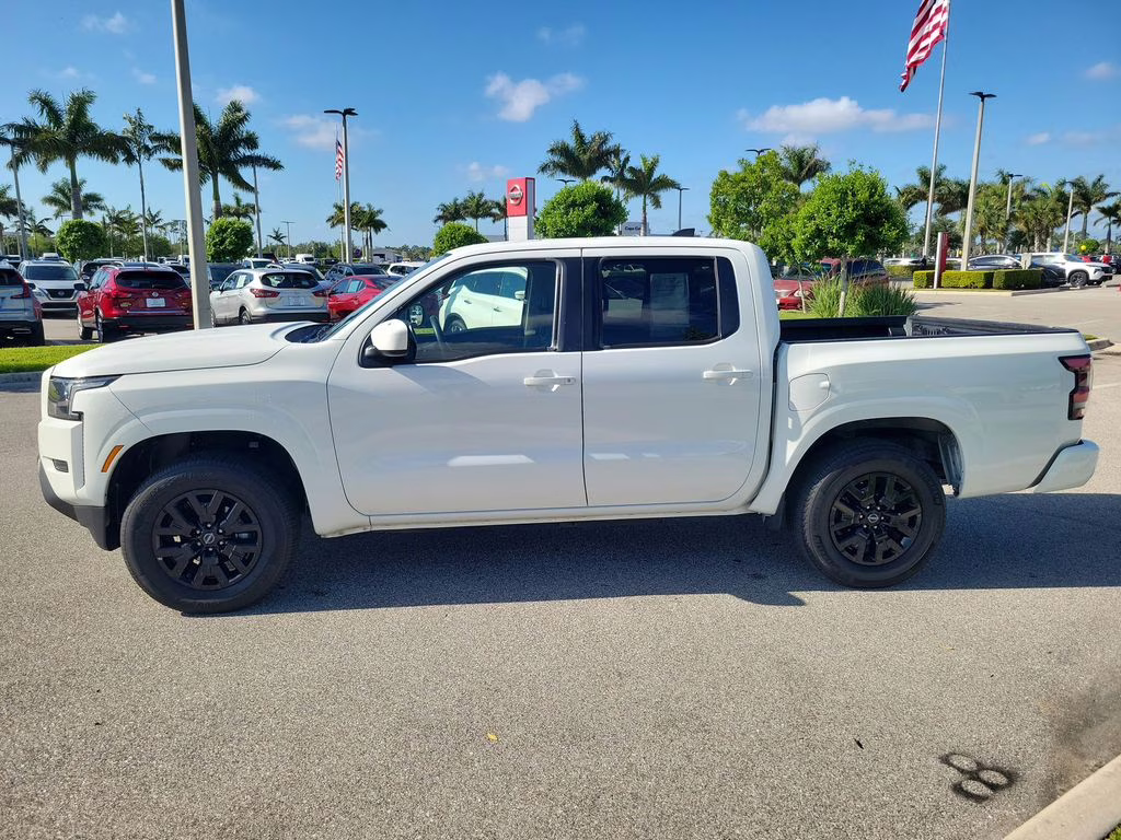 2023 Glacier White Nissan Frontier SV 4X4 Truck