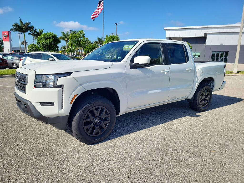 2023 Glacier White Nissan Frontier SV 4X4 Truck