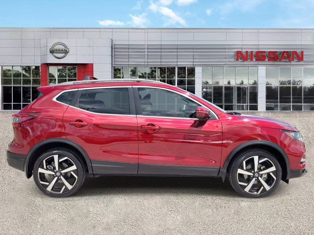 2022 Scarlet Ember Pearl Metallic Nissan Rogue Sport SL AWD SUV