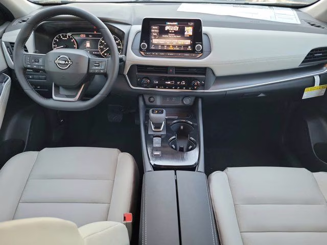 2026 Everest White Pearl Tricoat Nissan Rogue Dark Armor FWD SUV