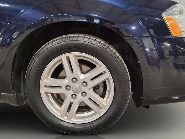 2011 Blackberry Pearlcoat Dodge Avenger Mainstreet FWD Sedan