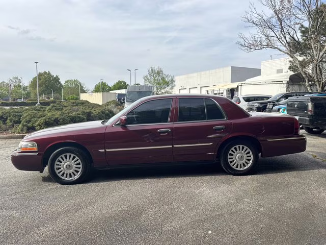 2004 Dark Toreador Red Clearcoat Metallic Mercury Grand Marquis GS RWD Sedan
