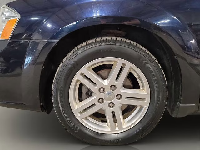 2011 Blackberry Pearlcoat Dodge Avenger Mainstreet FWD Sedan