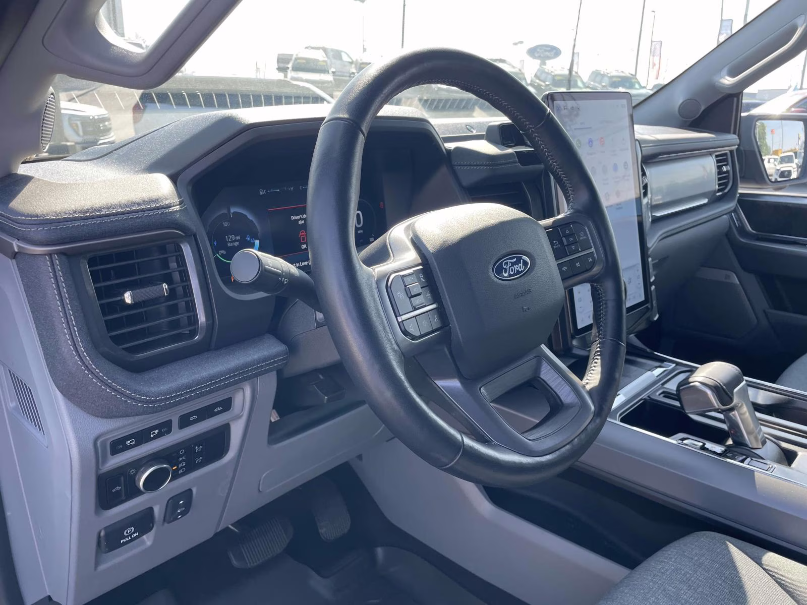 2024 Agate Black Metallic Ford F-150 Lightning Flash AWD Truck