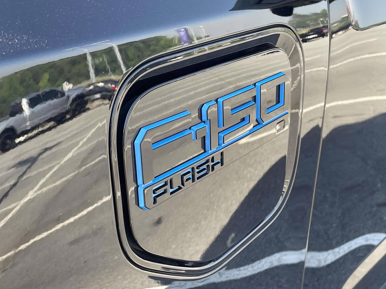 2024 Agate Black Metallic Ford F-150 Lightning Flash AWD Truck