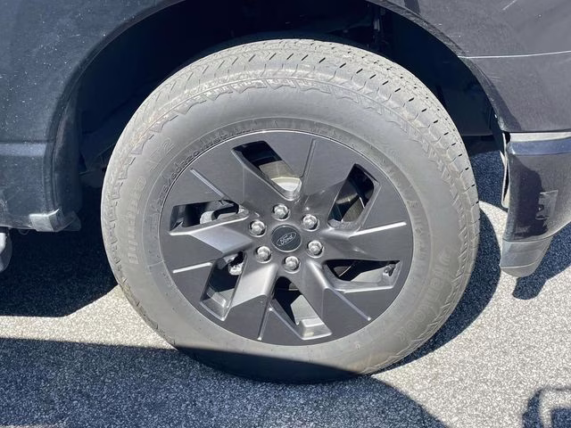 2024 Agate Black Metallic Ford F-150 Lightning Flash AWD Truck