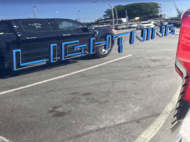2024 Agate Black Metallic Ford F-150 Lightning Flash AWD Truck