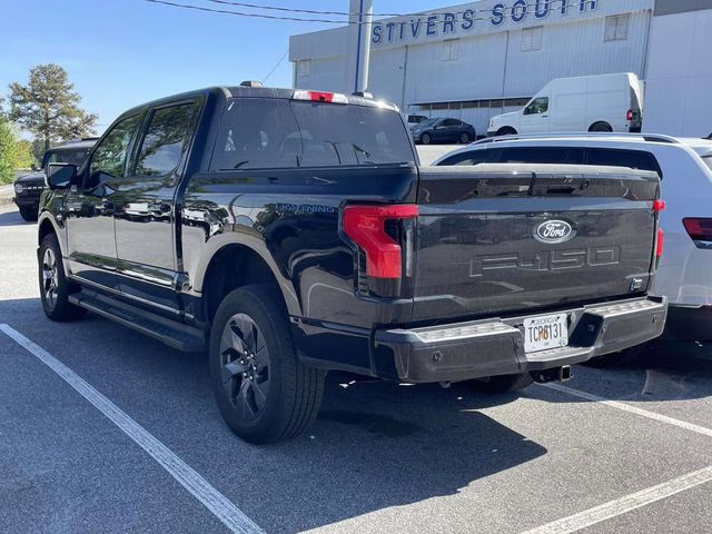 2024 Agate Black Metallic Ford F-150 Lightning Flash AWD Truck