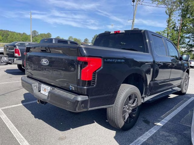 2024 Agate Black Metallic Ford F-150 Lightning Flash AWD Truck