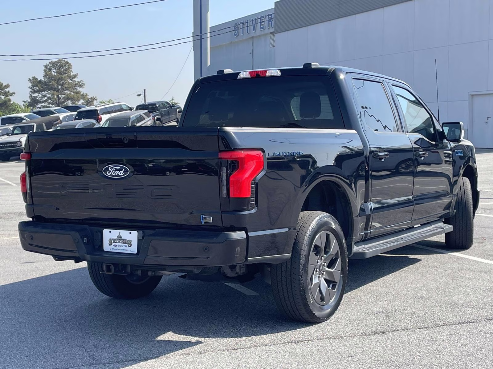 2024 Agate Black Metallic Ford F-150 Lightning Flash AWD Truck