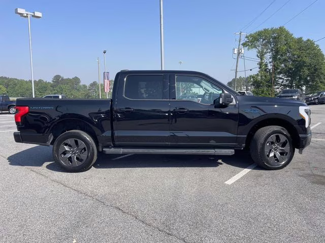 2024 Agate Black Metallic Ford F-150 Lightning Flash AWD Truck
