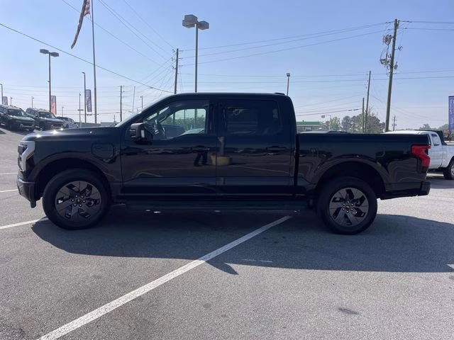 2024 Agate Black Metallic Ford F-150 Lightning Flash AWD Truck