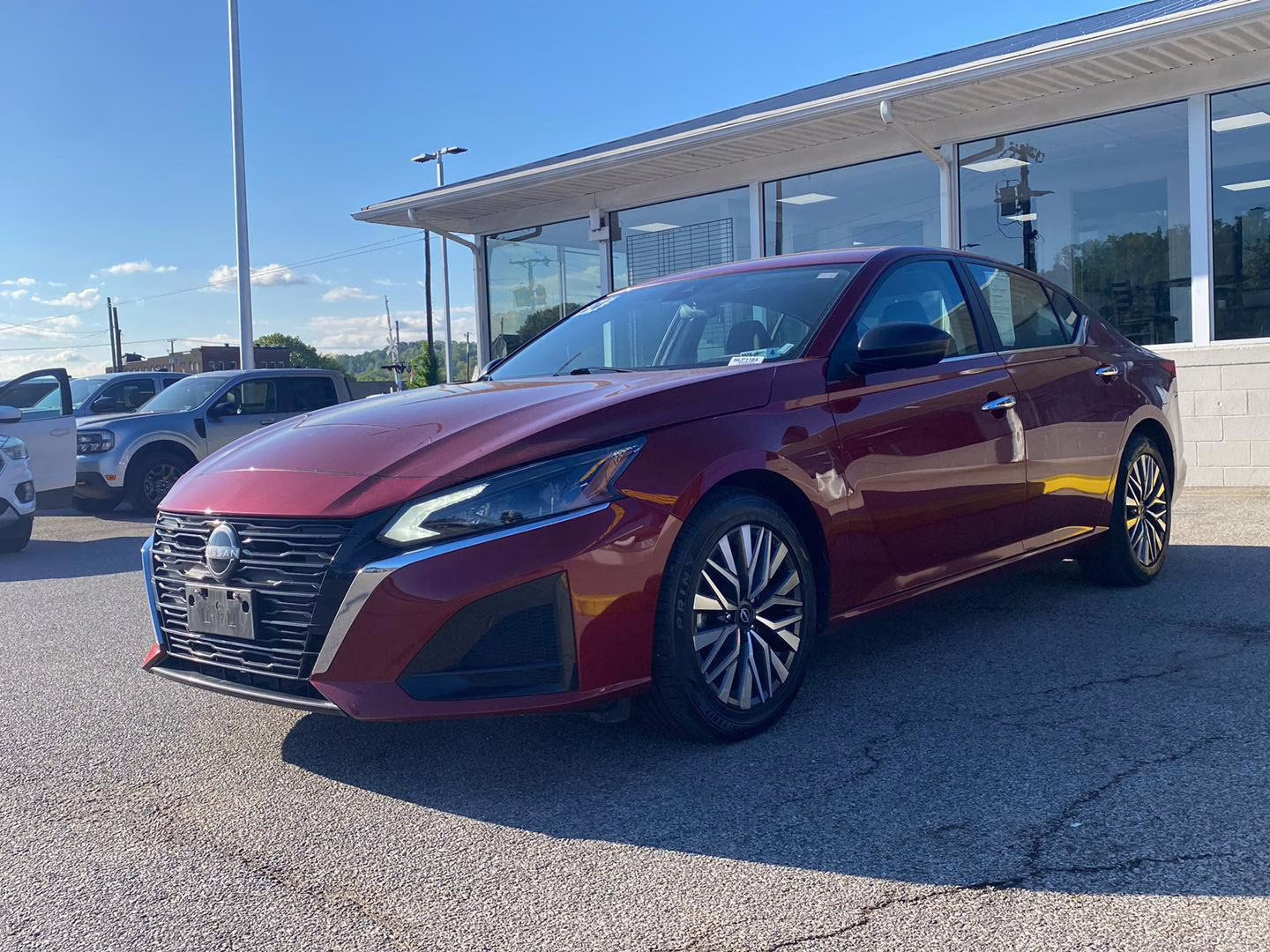 2024 Scarlet Ember Nissan Altima 2.5 SV FWD Sedan