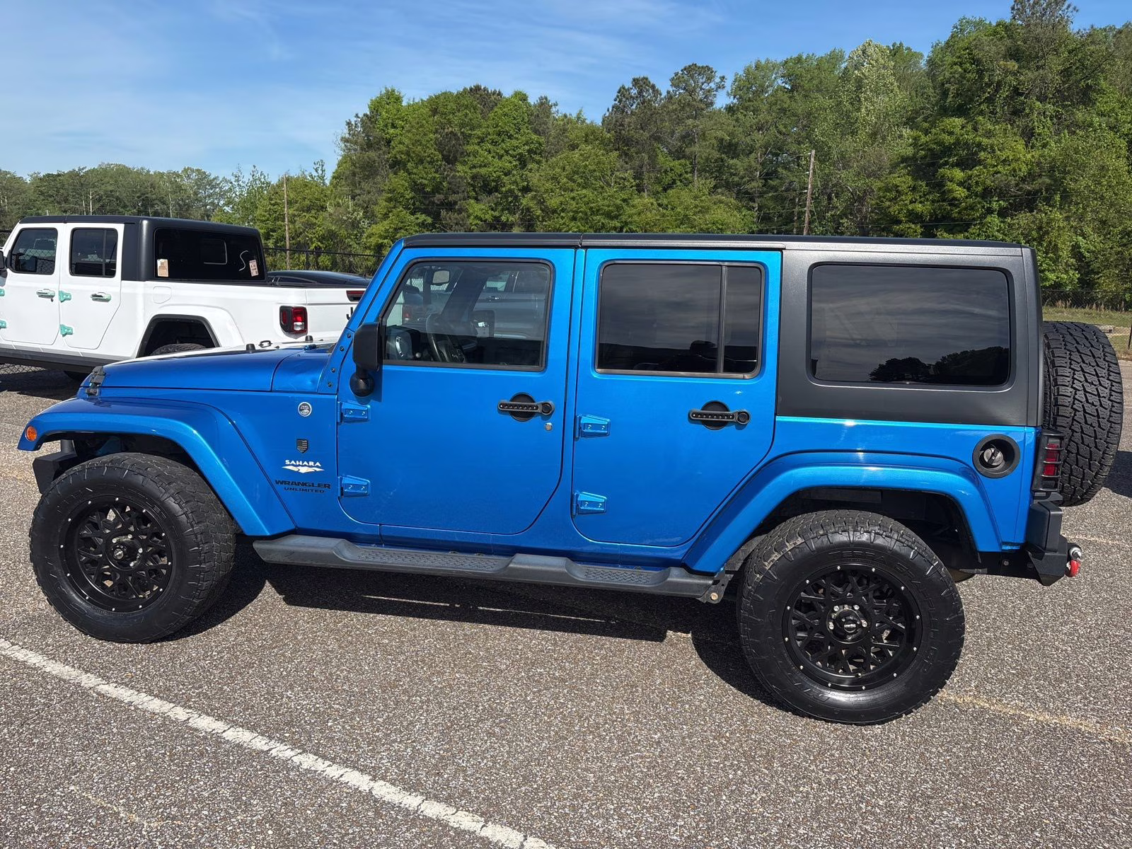 2015 Hydro Blue Pearl Coat Jeep Wrangler Unlimited Sahara 4X4 SUV