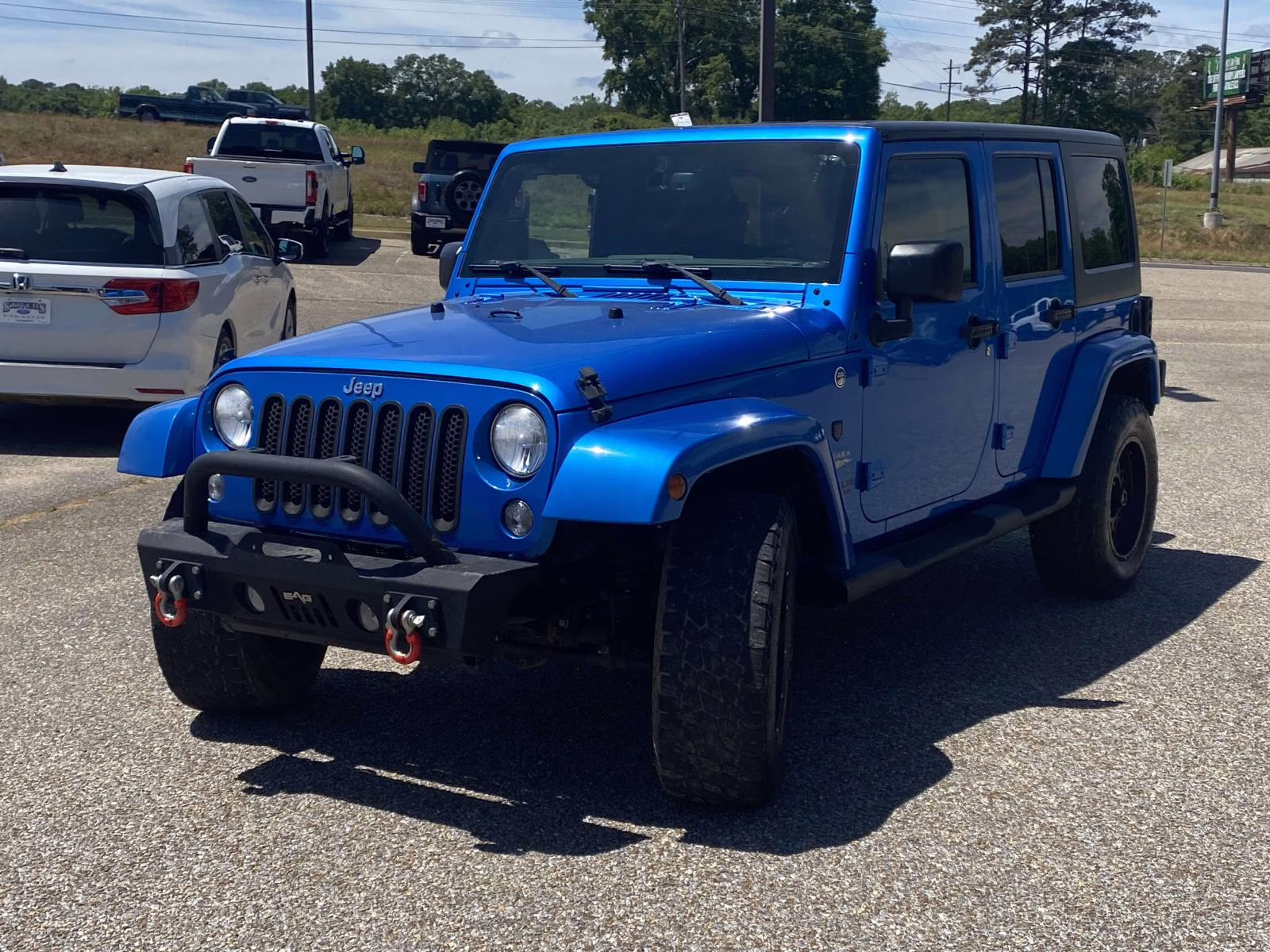 2015 Hydro Blue Pearl Coat Jeep Wrangler Unlimited Sahara 4X4 SUV