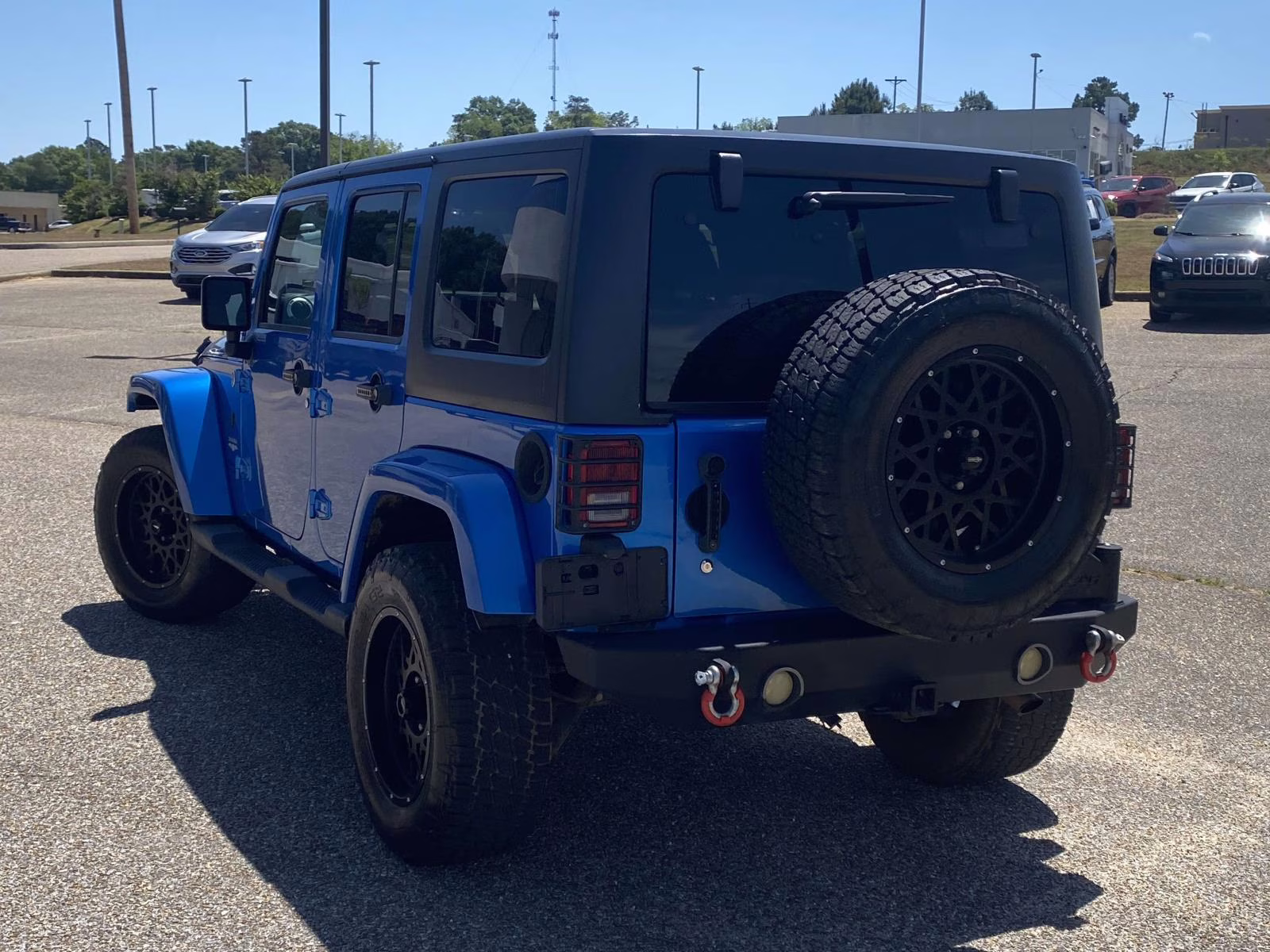 2015 Hydro Blue Pearl Coat Jeep Wrangler Unlimited Sahara 4X4 SUV
