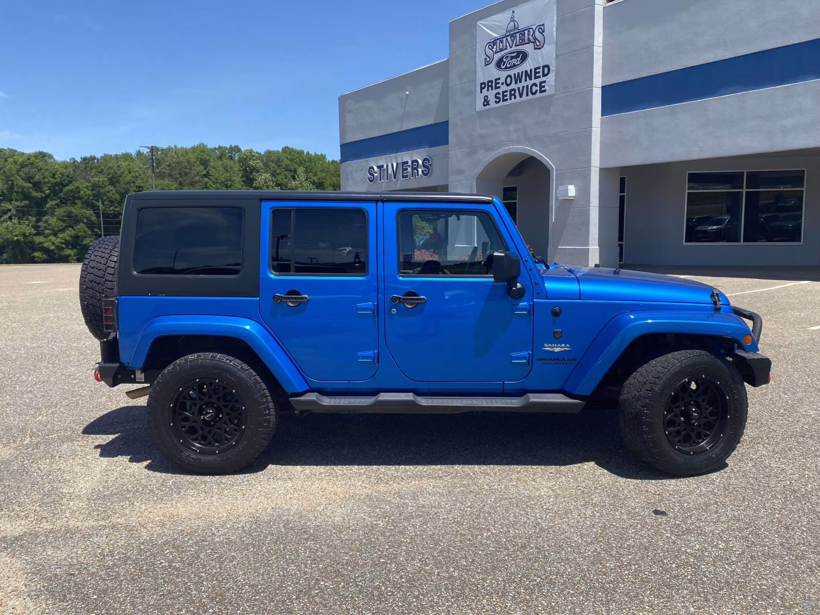 2015 Hydro Blue Pearl Coat Jeep Wrangler Unlimited Sahara 4X4 SUV