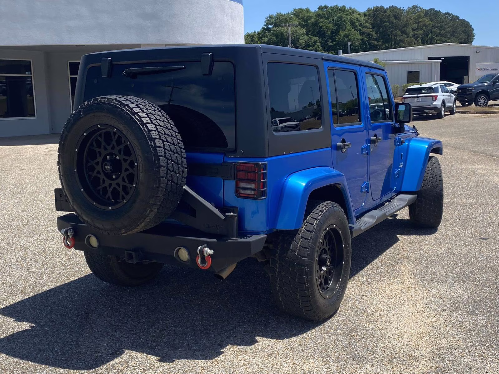 2015 Hydro Blue Pearl Coat Jeep Wrangler Unlimited Sahara 4X4 SUV