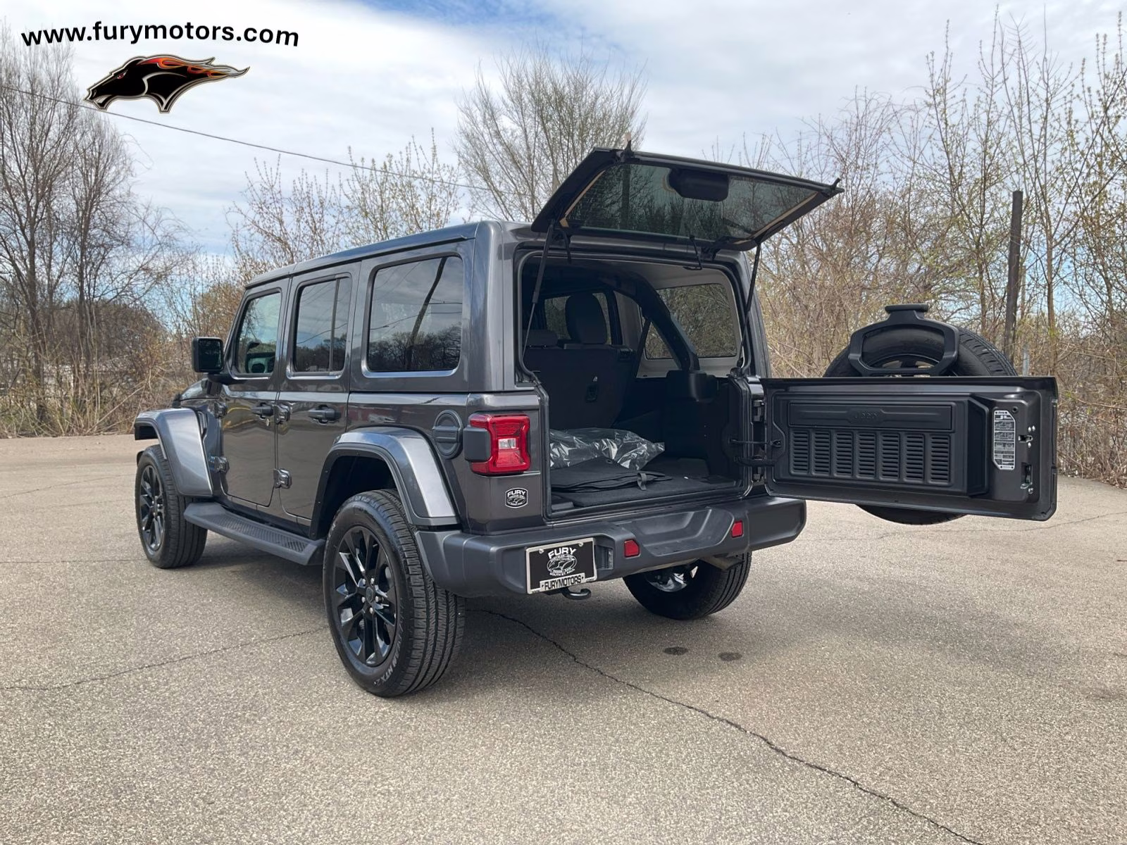 2025 Granite Crystal Metallic Clearcoat Jeep Wrangler Sahara 4xe 4X4 SUV