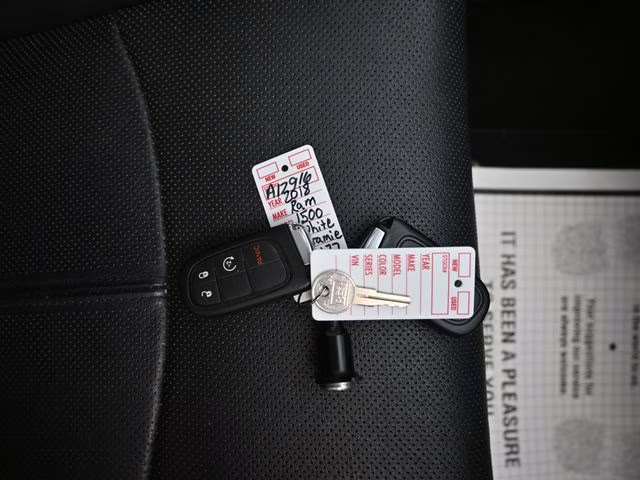 2018 Bright White Clearcoat Ram 1500 Laramie 4X4 Truck