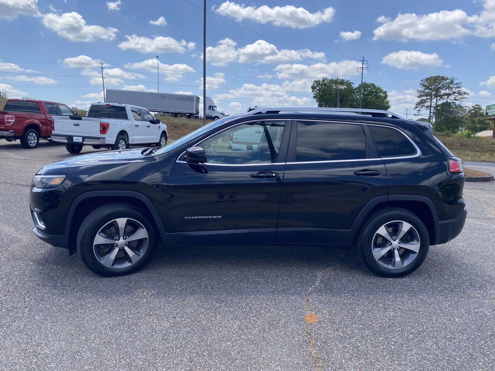 2019 Diamond Black Crystal Pearlcoat Jeep Cherokee Limited 4X4 SUV