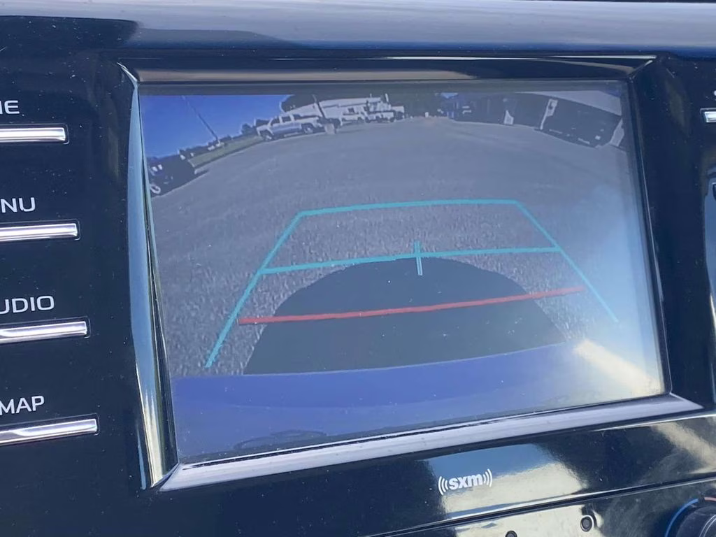 2020 Super White Toyota Camry LE FWD Sedan