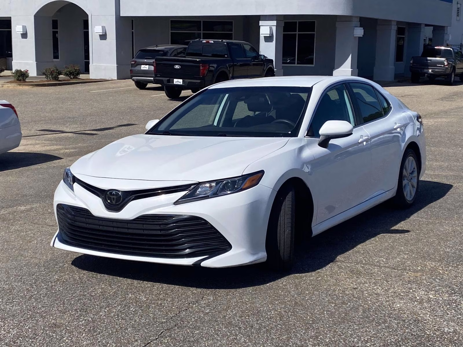 2020 Super White Toyota Camry LE FWD Sedan