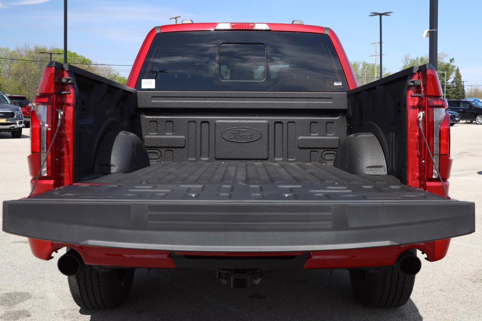 2025 Rapid Red Metallic Tinted Clearcoat Ford F-150 LARIAT 4X4 Truck