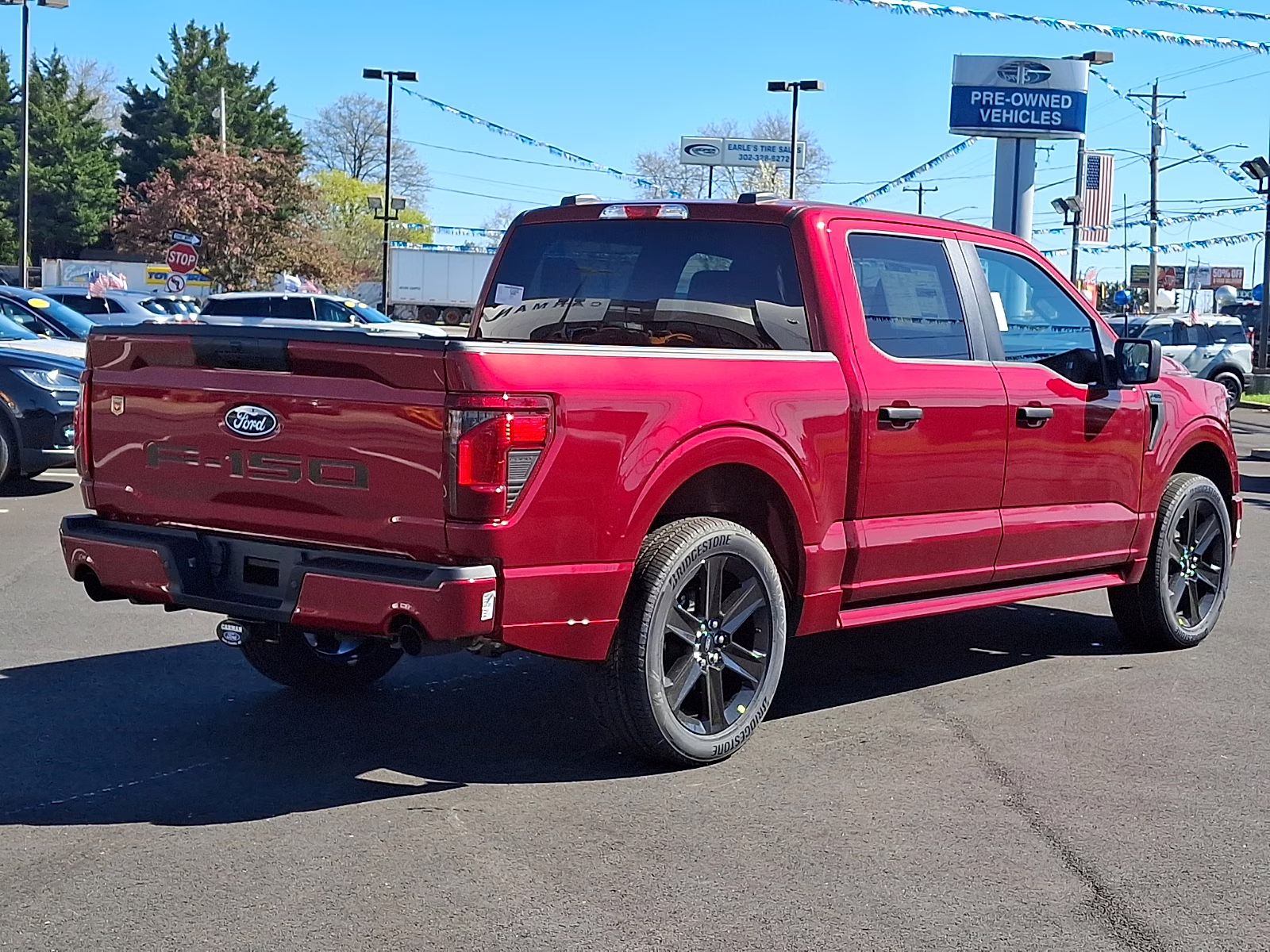 2026 Ruby Red Metallic Tinted Clearcoat - RR Ford F-150 STX 4X4
