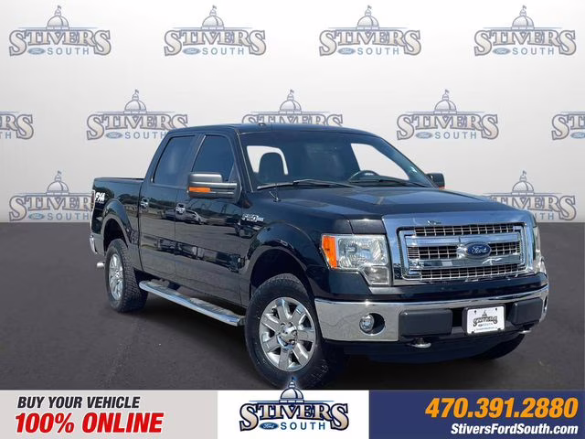2013 Tuxedo Black Metallic Ford F-150 XLT 4X4 Truck