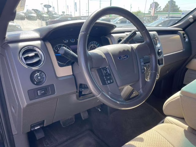 2013 Tuxedo Black Metallic Ford F-150 XLT 4X4 Truck