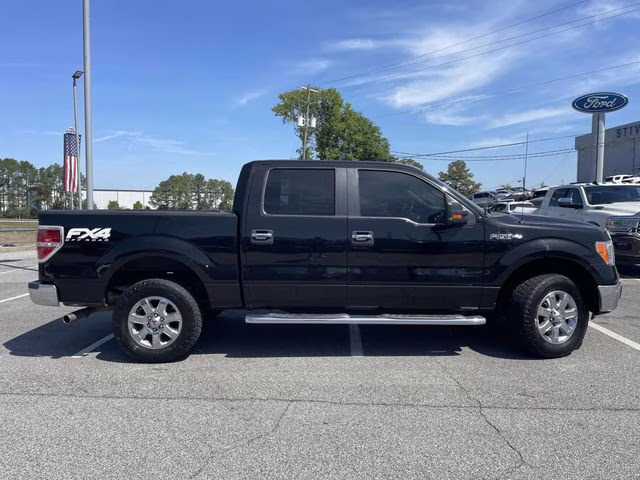 2013 Tuxedo Black Metallic Ford F-150 XLT 4X4 Truck