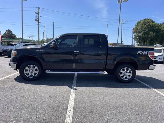 2013 Tuxedo Black Metallic Ford F-150 XLT 4X4 Truck